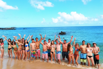 a group of people on private tour of oahu